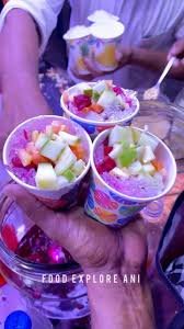 Authentic street-style South Indian Churandi shaved ice cups layered with fruit syrups, diced fruits, and sweet toppings.